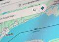 Close-up of a Google Maps interface with a 'Search Google Maps' field over a map showing Toronto and nearby roads near Lake Ontario.