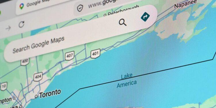 Close-up of a Google Maps interface with a 'Search Google Maps' field over a map showing Toronto and nearby roads near Lake Ontario.